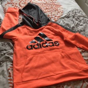 Bright salmon colored athletic hoodie